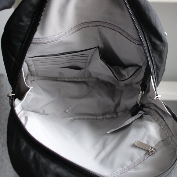 Magellan Black Anti-Theft Locking Zippers Slash-Resistant Nylon Mini Backpack - Picture 7 of 13